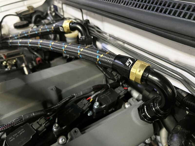 GReddy AN10 Straight Swivel Hose End - Black/Gold Anodized