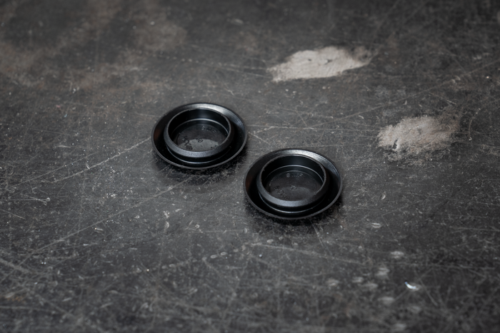 E30 Front License Plate Delete Plugs