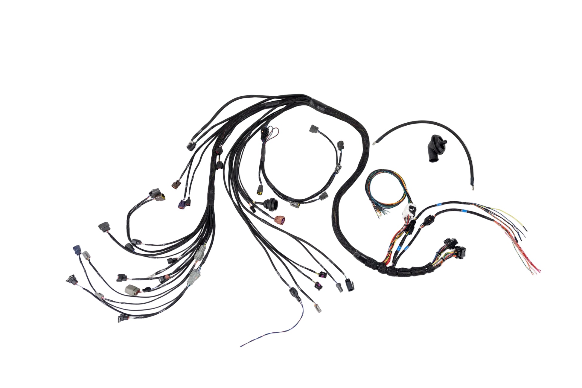 An automotive wiring harness kit with multiple black-wrapped cables, various connector types, and small black plastic components, laid out on a white background.