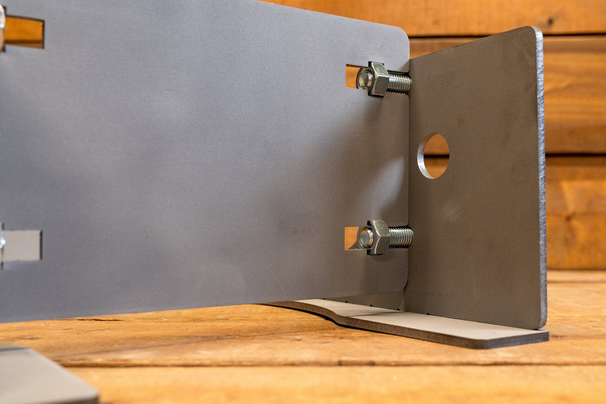 Universal quick change mount jig plate with tab and slot design