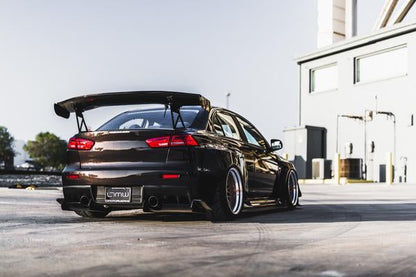 rear angled view of black EVO X with Custom Wide Body Kit
