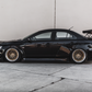 side view of black EVO X with Custom Wide Body Kit