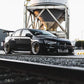 front side angled view of black EVO X with Custom Wide Body Kit