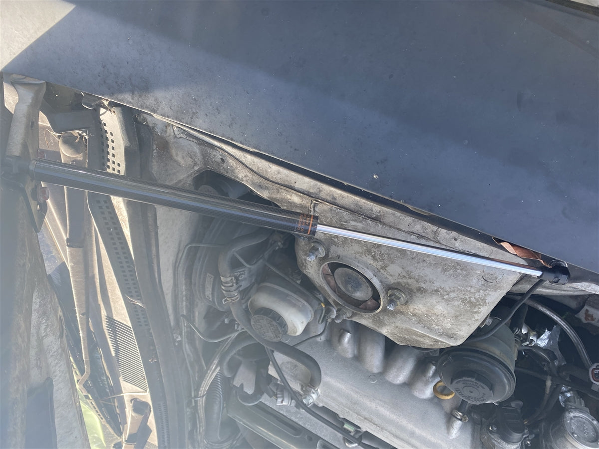 P2M - AMORTIGUADOR CAPOT CARBONO NISSAN S14 1995-98 240SX (P2-CHDNS14-TP)